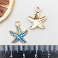Macro detail of blue starfish pendants showing gradient enamel texture and gold back - Enamel Lake Blue Starfish (8610)