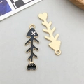 Cute black enamel fishbone alloy charms for DIY jewelry making in black and gold finish - Black Enamel Ocean Fish Bone Style (12045)