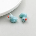 Light blue resin duck charms with silver metal rings for DIY jewelry and necklaces - Lake Blue