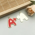 Letter A+ alloy charm pendant with red oil drip and gold textured back for DIY jewelry - Red A+ Style (16520)