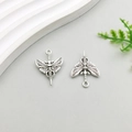 Close-up of vintage silver alloy moth and skull sword pendants for DIY jewelry making - Antique Silver Butterfly Skull Sword 18*25mm (18721)