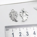 Detailed close-up of antique silver leaf pendants showing front and back textures for DIY - Leaf Style (3498)