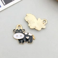 Cute black and white enamel cow charms for DIY jewelry with gold heart details - Black Enamel Cow Style (13900)