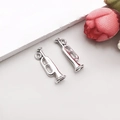 Detailed view of silver antique trumpet pendants for DIY jewelry and necklace crafting - Antique Silver Trumpet 7*22mm (9161)