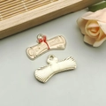 Enameled alloy diploma scroll charm with red bow and Graduate engraving for DIY jewelry - Gold Certificate Scroll Style (18795)