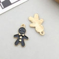 Cute black enamel gingerbread man alloy charm with gold finish and sunburst texture back - Black Enamel Christmas Snowman Gingerbread Man Style (17518)