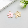 Detail of pink enamel cherry blossom pendant with golden metal back for DIY jewelry making - Pink Enamel Cherry Blossom (10961)