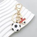 Golden alloy soccer keychain with black and white football charms and I Love Soccer tag - Soccer Medal Tag Style (ER770)