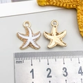 Vista macro de colgantes de estrella de mar en esmalte de colores con regla de medida - Estrella de Mar Blanca (15x18mm-1.1g-8609)