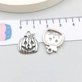 Macro detail of pumpkin pendants with antique silver finish and carved face texture - 15*18mm / Antique Silver Smiley Pumpkin (B336)