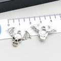 Detailed view of silver bat wing skull pendant with scale showing 3.5cm width - 1 Piece Antique Silver Winged Skull (10873)