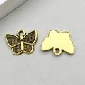 Pair of golden butterfly charms with detailed mesh texture and smooth back for DIY jewelry - Antique Gold Small Butterfly (11079)