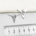 Macro detail of antique silver bull skull pendants showing both front and hollow back sides - Antique Silver Halloween Bull Skull (16968)