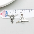 Detailed front and back view of retro silver ox skull pendants for DIY jewelry making - Antique Silver Halloween Bull Skull (16968)