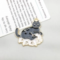 Mystical black cat enamel pendant with moon and star details for jewelry DIY - Black Cat Crouching on Skull (18141)