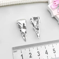 Pair of antique silver bird skull charms with ruler for 40mm size reference - Antique Silver Halloween Bird Skull (7524)