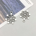 Antique silver snowflake charms in alloy with vintage texture and circular hanging loops - Christmas Snowflake (9148)