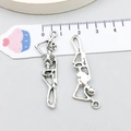 Antique silver skeleton pendant charm for DIY jewelry with ruler for scale reference - 12*43mm / Antique Silver Hanging Skeleton (5592)