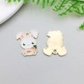 Detail of bunny enamel pendants showing white drip oil finish and golden textured back - 20x24mm / White Enamel Bunny Holding Carrot Style