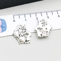 Antique silver Halloween witch and cauldron alloy pendants shown with a ruler - 1 Piece Antique Silver Wizard (10869)