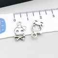 Skull with bow pendant in antique silver finish for DIY jewelry making size 15mm - 1 Piece Antique Silver Skull Head (10878)