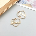 Ciondoli a cuore dorati con scritta 'Love' per la creazione di gioielli fai-da-te - Cuore Love Traforato KC Oro 21*19mm (17684)