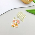 Pendentif lapin en alliage avec finition émail et placage doré pour bijoux DIY - Lapin Fleuri