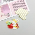 Enamel Easter bunny pendant with a red strawberry and golden alloy textured back - Strawberry Bunny (18546)