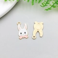 Cartoon Easter bunny pendant with white enamel finish and gold plated metal frame for DIY jewelry - 21x11mm / Pink Enamel Long Eared Bunny With Bowtie Style