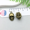Set van twee antieke bronzen doodskopbedels voor doe-het-zelf sieraden met vintage look - Schedel (205)