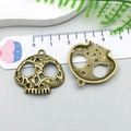 Antique bronze skull charms with hollow floral pattern for DIY jewelry making - Hollow Skull (3185)