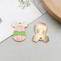 Pink and green enamel Easter egg pendant with bunny ears and golden sunburst back - Mirror Flower Design (18602)