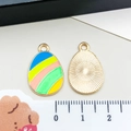 Colorful Easter egg enamel pendant in gold-plated alloy with vibrant striped design - Multicolor Striped Egg (15145)