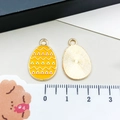 Easter egg charm in yellow enamel with wave pattern for DIY jewelry making - Yellow Easter Egg (15147)