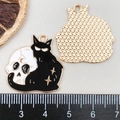 Detail of Halloween cat skull alloy pendant with measurements on a scale for DIY crafts - Black Skull Head Black Cat (19378)