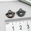 DIY Halloween charms featuring bloodthirsty vampire lips in dark brown and black matte finishes - Black Enamel Vampire Teeth (14005)