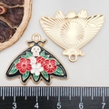 Macro shot of moth pendant showing skull enamel design and sunburst texture back - 24*29mm / Black Enamel Skull Butterfly (19617)