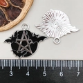 Detail view of pentagram bat charms with a ruler for size measurement and reference - Black Enamel Pentagram Bat