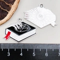Detailed front and back view of a pentagram book pendant showing enamel finish and size scale - Black Enamel Pentagram Magic Book