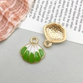 Green and white shell-shaped alloy charms with gold-plated edges for DIY jewelry making - 1 Piece (16x17mm)