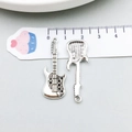 Detailed front and back view of a 42mm antique silver guitar pendant for DIY jewelry - Antique Silver Guitar (4841) / 12*28mm