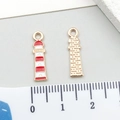 Detailed macro view of colorful lighthouse alloy pendant with red and white enamel finish - Red Enamel Lighthouse Style (21142)