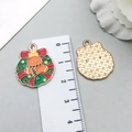 Christmas wreath alloy pendant with green enamel, red bow and golden textured back - Green Gingerbread Man Wreath (19688)