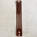 Detail of dark brown leather bracelet with laser-cut US flag stars and stripes design - US Flag Hollow Style (2)