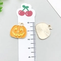 Orange enamel pumpkin charm with yellow smiley face and golden metal back for DIY crafts - Halloween Pumpkin (12497)
