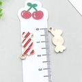 Red and white striped enamel candy pendant in gold finish with measurements - Halloween Candy (14018)