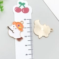 Ghost with orange starry hat alloy charm for jewelry making showing front and back - Flying Broom Ghost (15130)