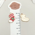 Christmas stocking charm with red and white enamel and a green flower detail - Red Christmas Sock (19560)