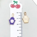 Purple coffin enamel pendant with white skull pattern and golden alloy finish - Halloween Skeleton Tombstone (19537)