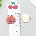 Enameled metal pumpkin charm for Halloween jewelry making with a golden finish - Halloween Pumpkin (19538)